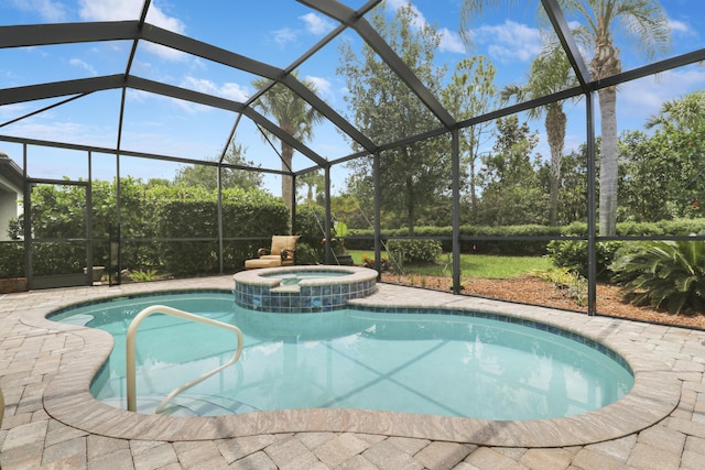 568 SE Monet Dr, Port Saint Lucie, FL 34984 - view of swimming pool featuring a pool with connected hot tub and glass enclosure