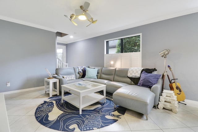 568 SE Monet Dr, Port Saint Lucie, FL 34984 - tiled living room with crown molding, a ceiling fan, and baseboards