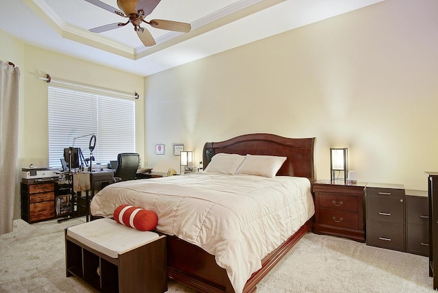 697 SW Dairy Rd, Port Saint Lucie, FL 34953 - bedroom featuring light colored carpet, an office area, crown molding, a raised ceiling, and ceiling fan