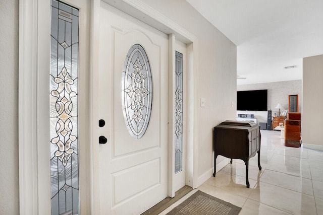 6650 NW 22nd Ct, Margate, FL 33063 - foyer with light tile patterned floors and baseboards
