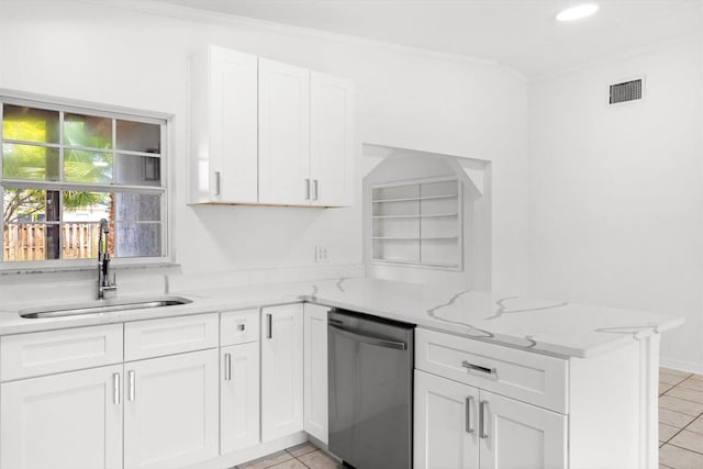 7802 Miramar Ave, Fort Pierce, FL 34951 - kitchen featuring dishwasher, a peninsula, a sink, white cabinets, and ornamental molding