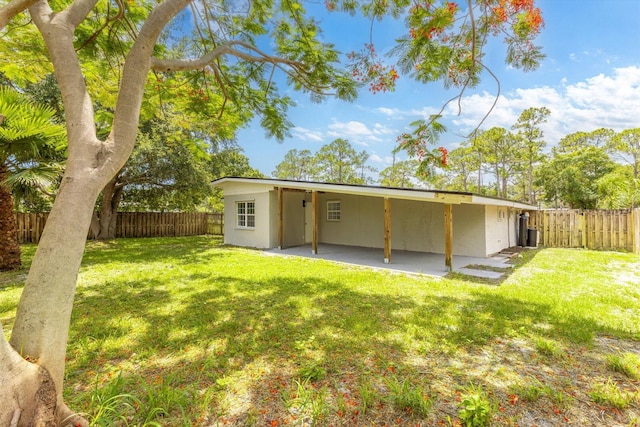 7802 Miramar Ave, Fort Pierce, FL 34951 - back of property featuring a patio area