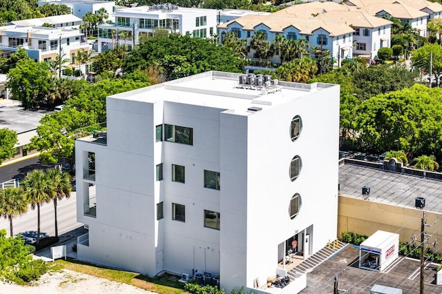 246 NE 6th Ave Unit Ph1, Delray Beach, FL 33483 - view of building exterior with view of scattered trees