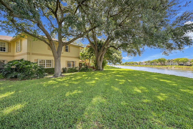 2934 SW 22nd Cir Unit 12A, Delray Beach, FL 33445 - view of green lawn with a water view