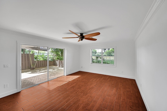 2934 SW 22nd Cir Unit 12A, Delray Beach, FL 33445 - unfurnished room featuring plenty of natural light, crown molding, a ceiling fan, and wood finished floors