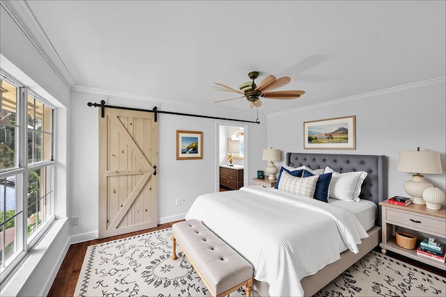 2934 SW 22nd Cir Unit 12A, Delray Beach, FL 33445 - bedroom with crown molding, a barn door, wood finished floors, a ceiling fan, and connected bathroom