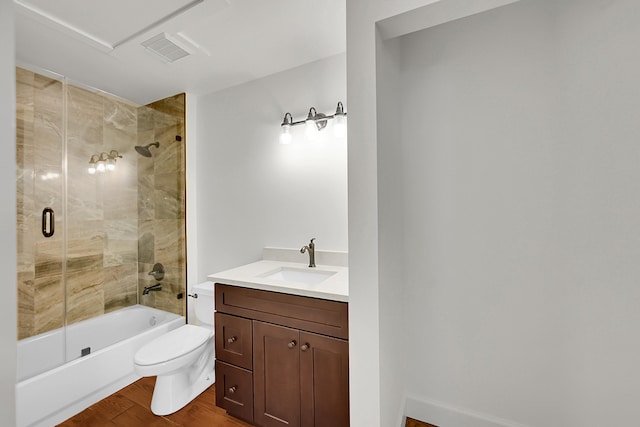 2934 SW 22nd Cir Unit 12A, Delray Beach, FL 33445 - full bath featuring vanity, wood finished floors, and enclosed tub / shower combo