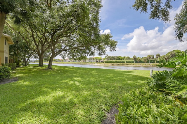 2934 SW 22nd Cir Unit 12A, Delray Beach, FL 33445 - view of green lawn featuring a water view