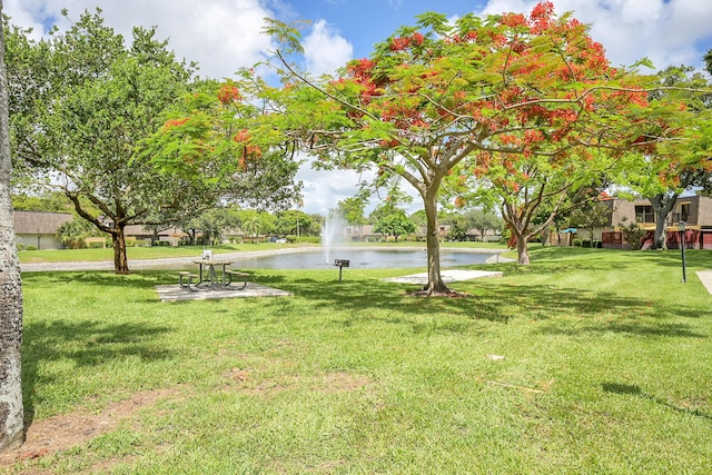 2934 SW 22nd Cir Unit 12A, Delray Beach, FL 33445 - view of property's community featuring a water view and a lawn