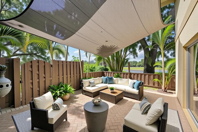 2934 SW 22nd Cir Unit 12A, Delray Beach, FL 33445 - fenced backyard featuring an outdoor hangout area, a patio, and a gate
