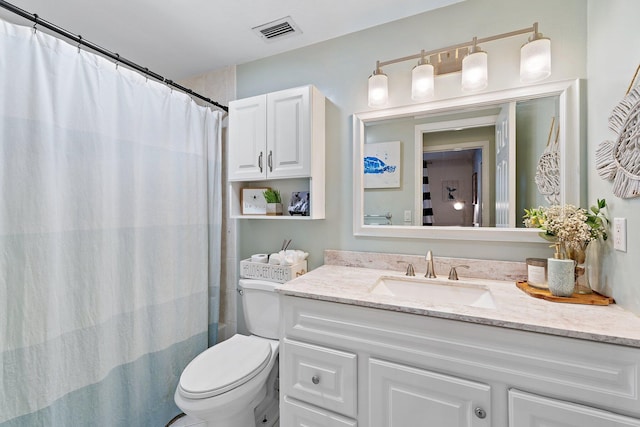 9674 Dogwood Ave, Palm Beach Gardens, FL 33410 - bathroom with vanity, toilet, and curtained shower