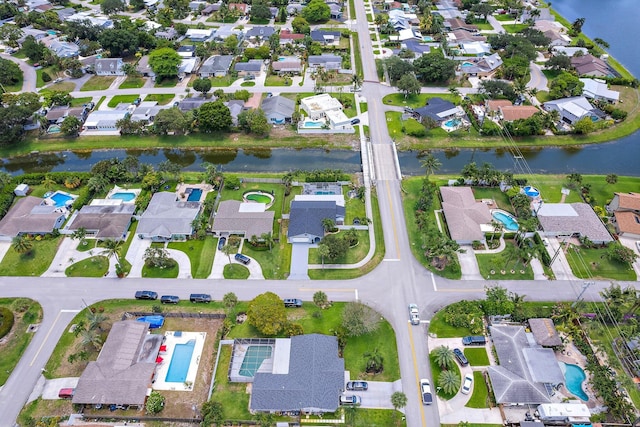 9674 Dogwood Ave, Palm Beach Gardens, FL 33410 - aerial overview of property's location with nearby suburban area and a nearby body of water