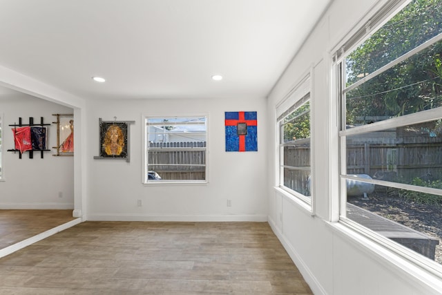 1509 N N St, Lake Worth Beach, FL 33460 - empty room featuring light wood finished floors, baseboards, and recessed lighting