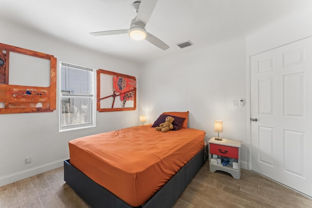 1509 N N St, Lake Worth Beach, FL 33460 - bedroom with wood finished floors, ceiling fan, and baseboards