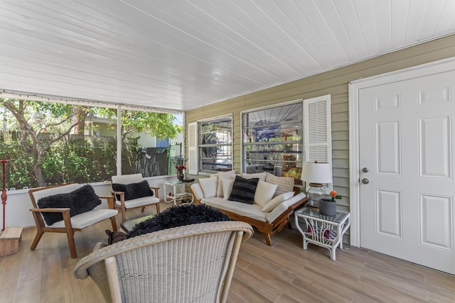 1509 N N St, Lake Worth Beach, FL 33460 - sunroom / solarium featuring wood finished floors and outdoor lounge area