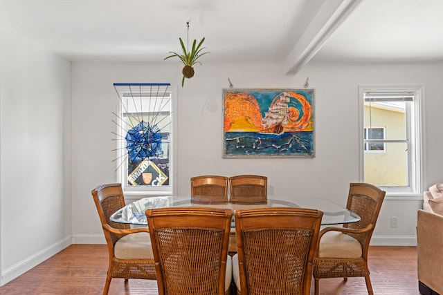 1509 N N St, Lake Worth Beach, FL 33460 - dining area featuring wood finished floors, baseboards, and beamed ceiling