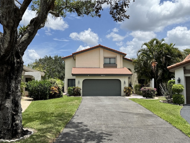 5625 Lakeview Mews Ct, Boynton Beach, FL 33437 - mediterranean / spanish home with a tiled roof, driveway, stucco siding, and a garage
