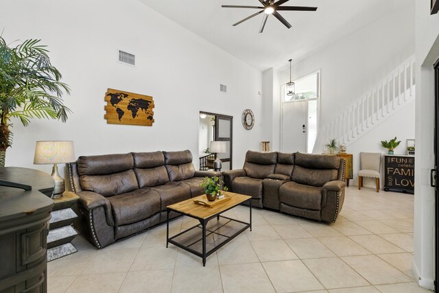 5625 Lakeview Mews Ct, Boynton Beach, FL 33437 - living room featuring a high ceiling, ceiling fan, light tile patterned floors, and stairway