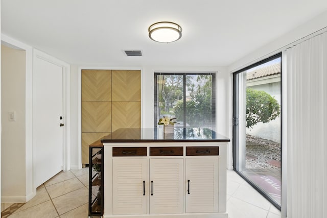5625 Lakeview Mews Ct, Boynton Beach, FL 33437 - kitchen with dark countertops and light tile patterned floors