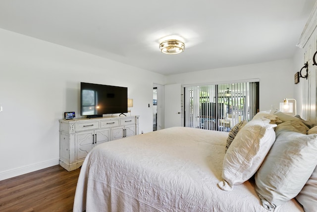 5625 Lakeview Mews Ct, Boynton Beach, FL 33437 - bedroom with baseboards, dark wood finished floors, and access to exterior
