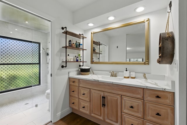 5625 Lakeview Mews Ct, Boynton Beach, FL 33437 - bathroom with vanity, tiled shower, toilet, and recessed lighting