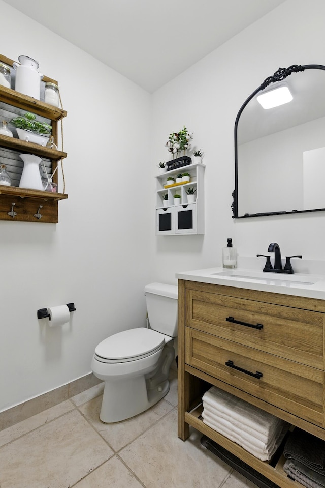 5625 Lakeview Mews Ct, Boynton Beach, FL 33437 - half bath featuring vanity, toilet, and tile patterned floors
