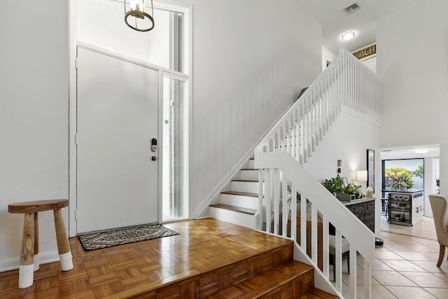5625 Lakeview Mews Ct, Boynton Beach, FL 33437 - foyer with a high ceiling, stairway, and baseboards