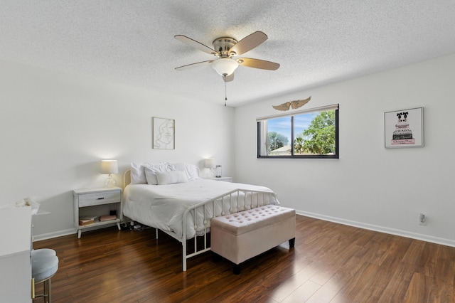 5625 Lakeview Mews Ct, Boynton Beach, FL 33437 - bedroom with a textured ceiling, wood finished floors, baseboards, and ceiling fan