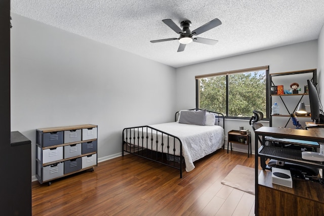 5625 Lakeview Mews Ct, Boynton Beach, FL 33437 - bedroom with wood finished floors, a textured ceiling, and a ceiling fan