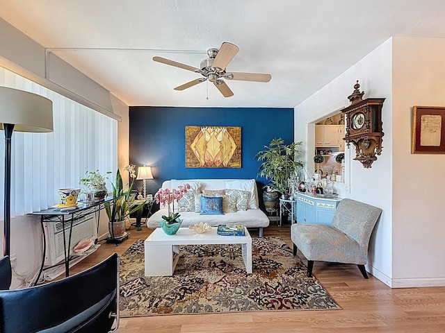 301 E Mcnab Rd Unit 214, Pompano Beach, FL 33060 - living room featuring wood finished floors, ceiling fan, and baseboards