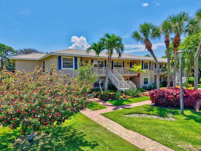 7 Stratford Dr Unit C, Boynton Beach, FL 33436 - view of property with stairway