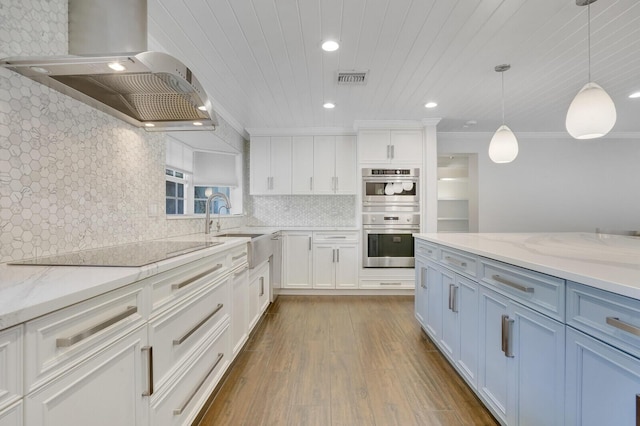 4040 Gem Lake Dr, Glen Ridge, FL 33406 - kitchen with stainless steel double oven, black electric cooktop, wall chimney range hood, white cabinets, and wooden ceiling