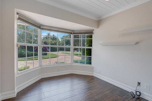 4040 Gem Lake Dr, Glen Ridge, FL 33406 - spare room featuring ornamental molding, dark wood-style flooring, healthy amount of natural light, and baseboards
