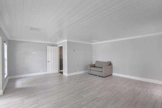 4040 Gem Lake Dr, Glen Ridge, FL 33406 - unfurnished room with crown molding, baseboards, and light wood finished floors