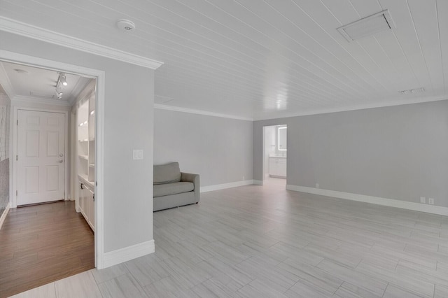 4040 Gem Lake Dr, Glen Ridge, FL 33406 - unfurnished living room featuring ornamental molding, baseboards, and light wood-style flooring