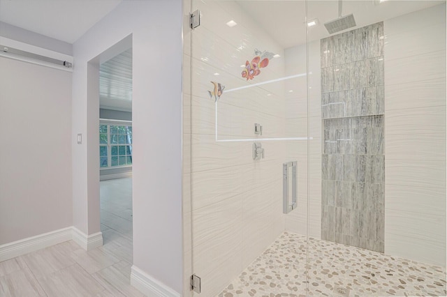 4040 Gem Lake Dr, Glen Ridge, FL 33406 - full bathroom featuring a stall shower, tile patterned flooring, and baseboards