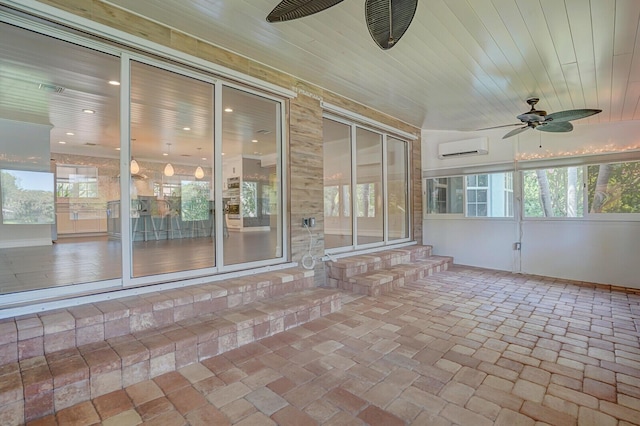 4040 Gem Lake Dr, Glen Ridge, FL 33406 - unfurnished sunroom with entry steps, a ceiling fan, a wall mounted air conditioner, and healthy amount of natural light