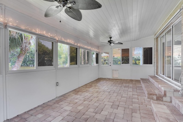 4040 Gem Lake Dr, Glen Ridge, FL 33406 - unfurnished sunroom with ceiling fan and entry steps