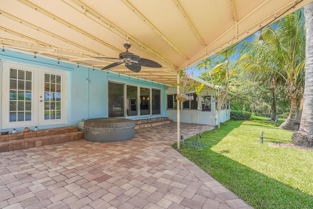 4040 Gem Lake Dr, Glen Ridge, FL 33406 - view of patio / terrace featuring french doors, ceiling fan, and a hot tub