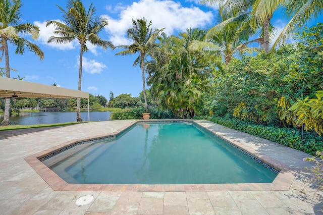 4040 Gem Lake Dr, Glen Ridge, FL 33406 - swimming pool featuring a patio area and a water view