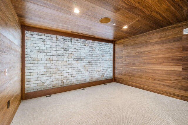 220 SE Mizner Blvd Unit 409, Boca Raton, FL 33432 - spare room with wooden walls, wood ceiling, and carpet flooring