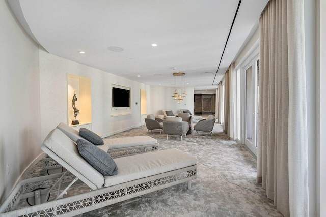 220 SE Mizner Blvd Unit 409, Boca Raton, FL 33432 - living area with carpet flooring, recessed lighting, and baseboards