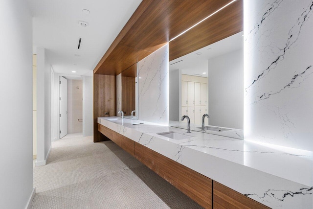 220 SE Mizner Blvd Unit 409, Boca Raton, FL 33432 - full bathroom with double vanity and recessed lighting