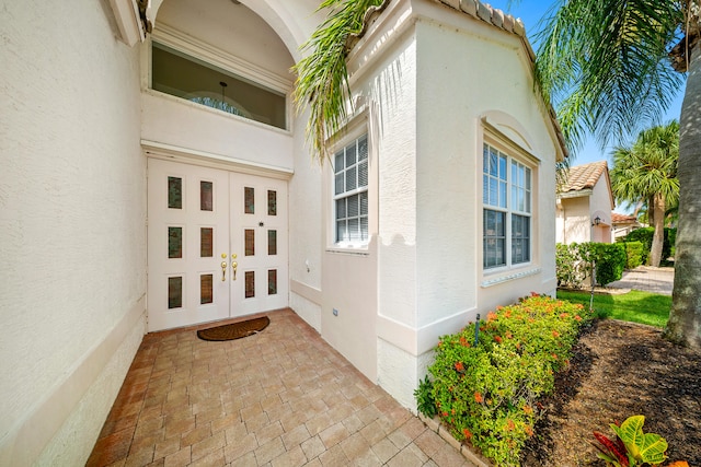 296 NW Toscane Trl, Port Saint Lucie, FL 34986 - property entrance featuring stucco siding