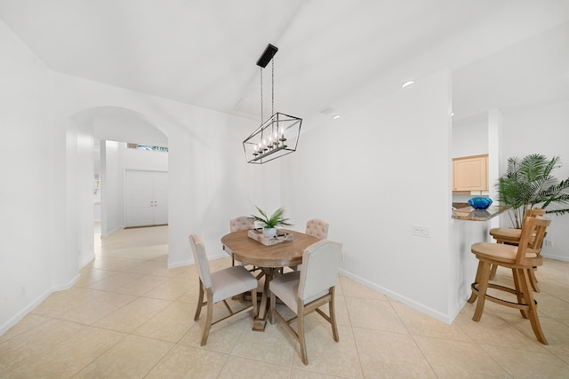 296 NW Toscane Trl, Port Saint Lucie, FL 34986 - dining room featuring arched walkways, light tile patterned floors, and baseboards