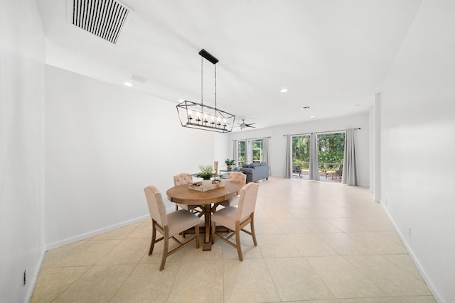 296 NW Toscane Trl, Port Saint Lucie, FL 34986 - dining area with light tile patterned floors, recessed lighting, a chandelier, and baseboards