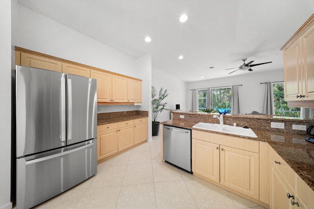 296 NW Toscane Trl, Port Saint Lucie, FL 34986 - kitchen featuring stainless steel appliances, a sink, light brown cabinetry, light tile patterned floors, and ceiling fan