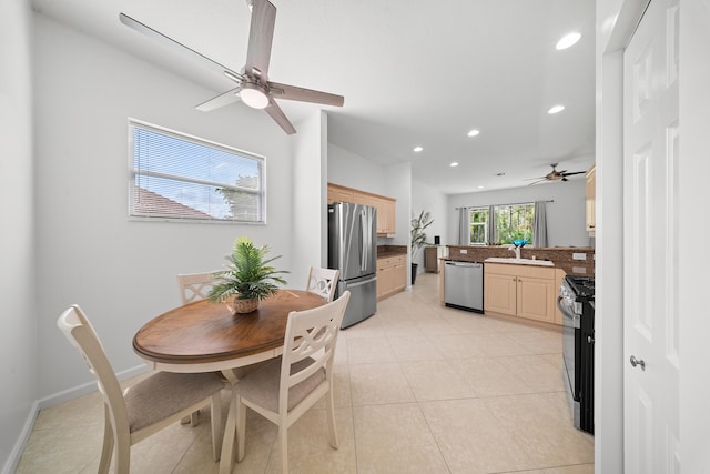 296 NW Toscane Trl, Port Saint Lucie, FL 34986 - dining room with ceiling fan, recessed lighting, light tile patterned flooring, and baseboards