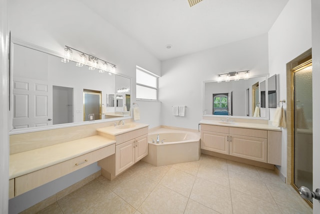 296 NW Toscane Trl, Port Saint Lucie, FL 34986 - full bathroom with a bath, a shower stall, two vanities, and tile patterned flooring