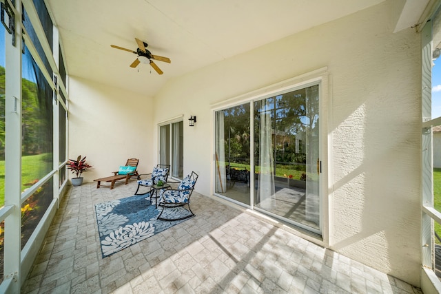 296 NW Toscane Trl, Port Saint Lucie, FL 34986 - unfurnished sunroom with a ceiling fan, healthy amount of natural light, and vaulted ceiling